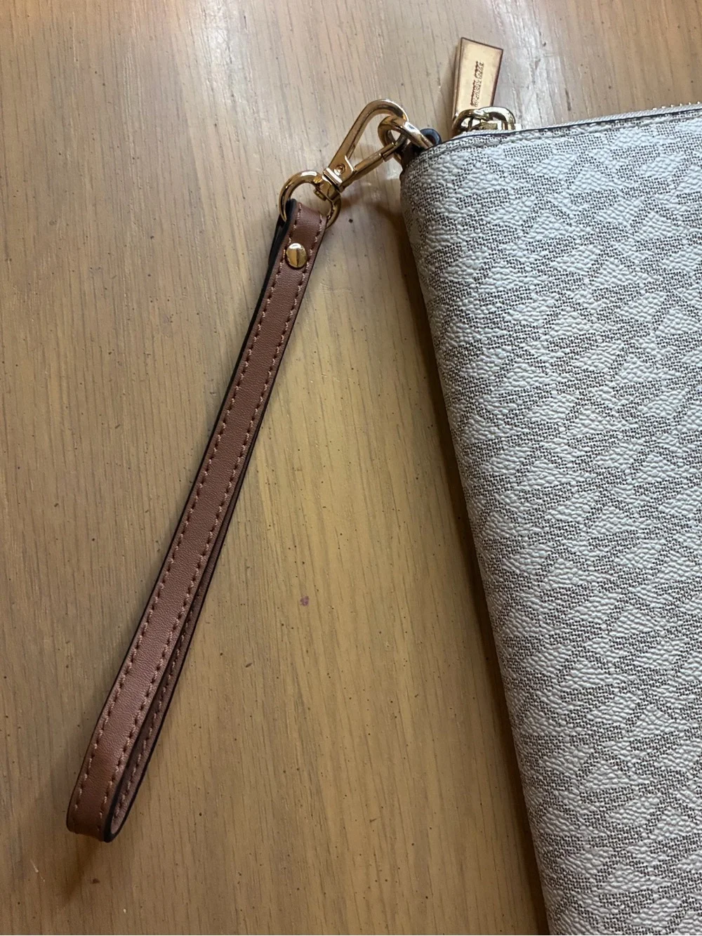 Michael Kors Silver Metallic Logo Zip Wristlet with Brown Strap